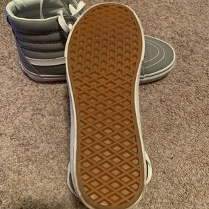 Size 8 Gray High Top Vans. Only worn a few times. In excellent condition.